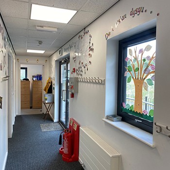 hallway with decorated windows