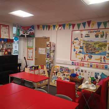 aberwla on the wall and reading corner underneath