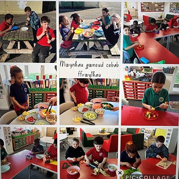 students cutting up fruit